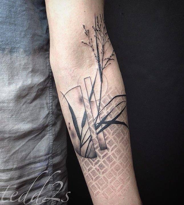Abstract plant tattoo by Tedd Hucks