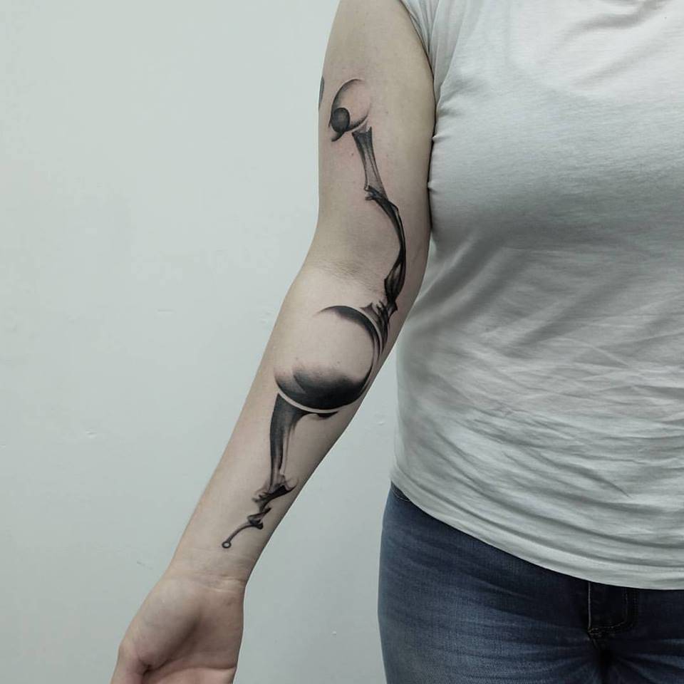 Abstract tattoo on arm by Roman Melnikov Plebey Boy