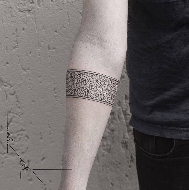 Amazing geometric armband tattoo by Rach Ainsworth