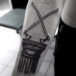 Axes and Doric order tattoo