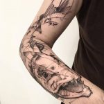 Barracuda tattoo on the forearm
