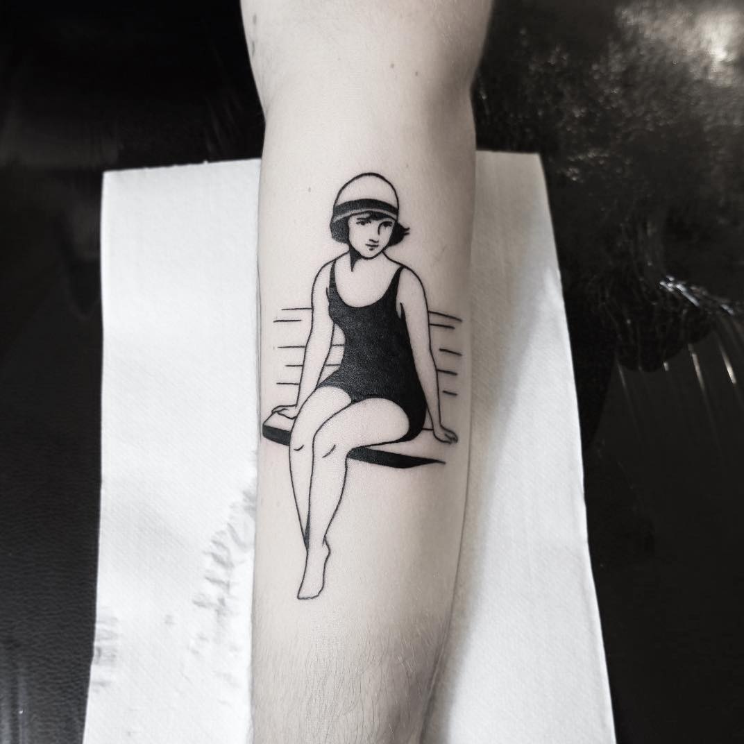 Beach lady tattoo done at Queen Of Arts Tattooing
