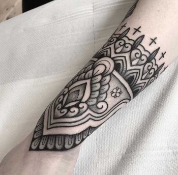 Black ornament tattoo by Jack Peppiette