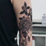 Black rose tattoo by Olga Nekrasova