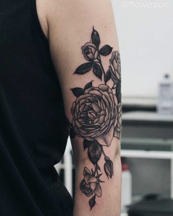 Black rose tattoo by Olga Nekrasova