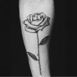 Blackwork engraving rose tattoo