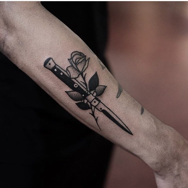 Blade and rose tattoo by Jonas Ribeiro