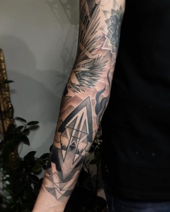 Cool black and grey sleeve tattoo