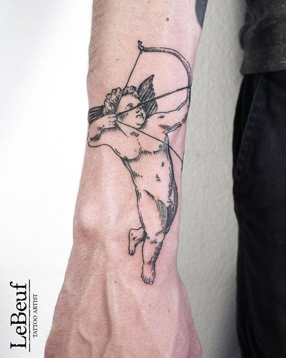 Cupid tattoo by Loïc Lebeuf
