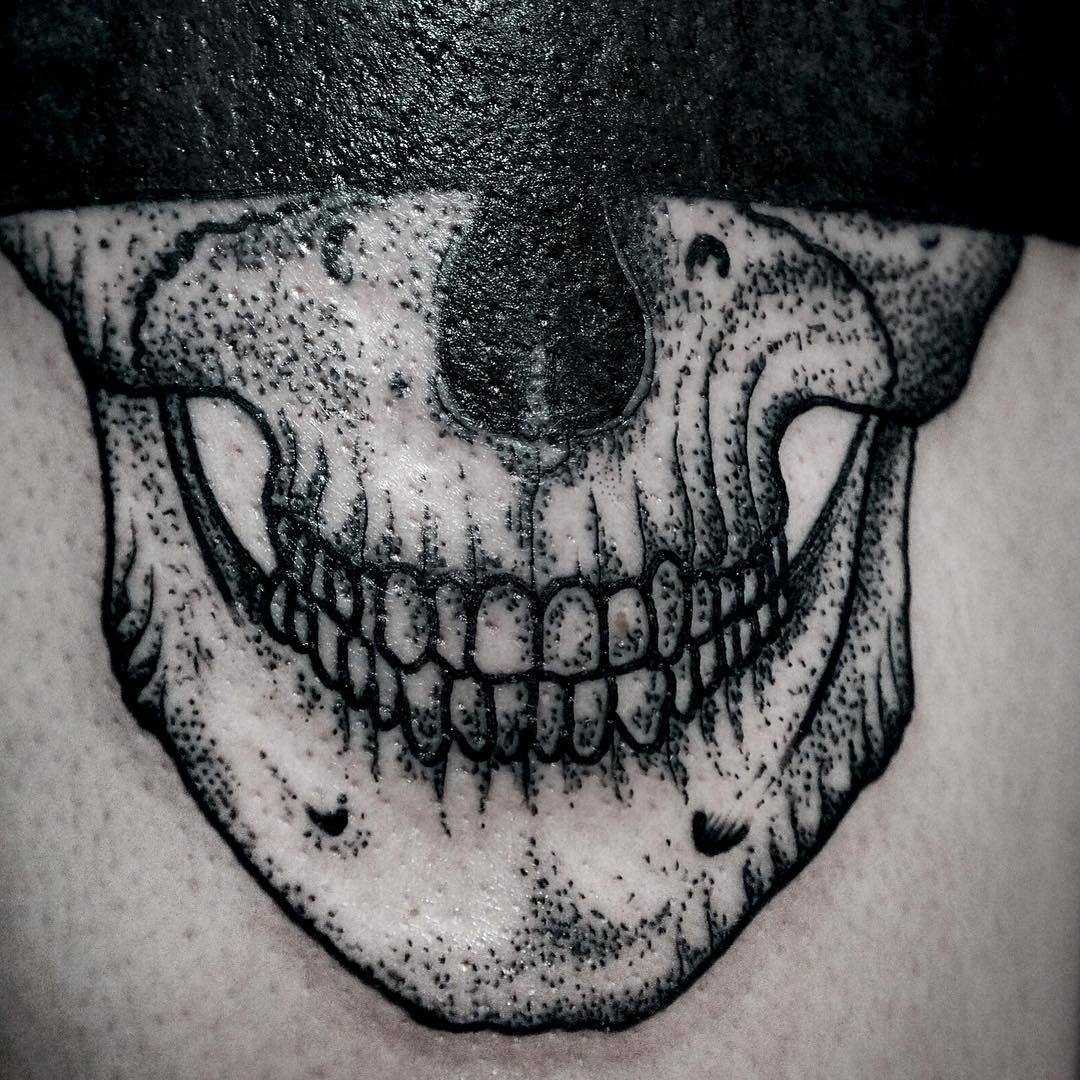 Detailed skull tattoo