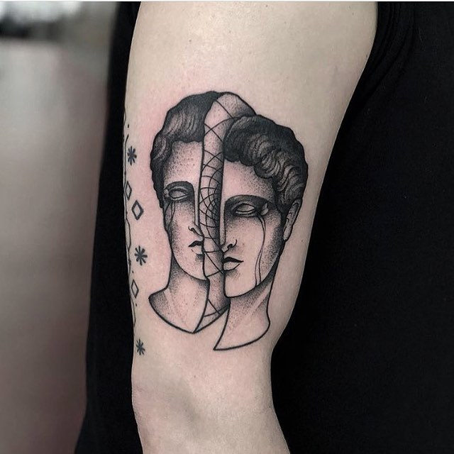 Divided head tattoo by Jonas Ribeiro