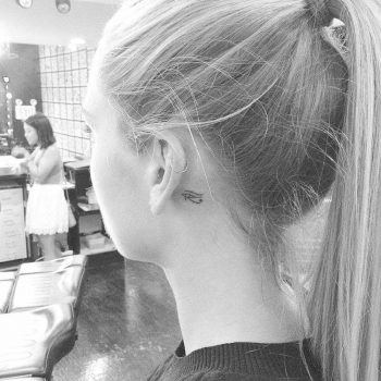 Eye Of Horus tattoo behind the ear