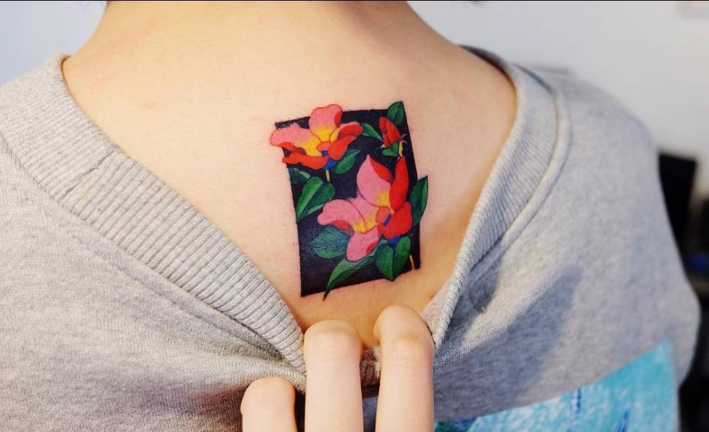 Floral rectangle tattoo on the back
