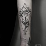 Flower tattoo by Ilya Anisimov