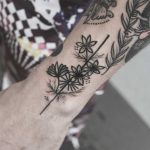Flowers and line tattoo