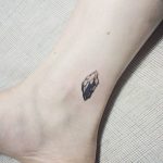 Gem tattoo on the ankle