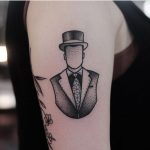 Gentleman's bust tattoo by Jonas Ribeiro