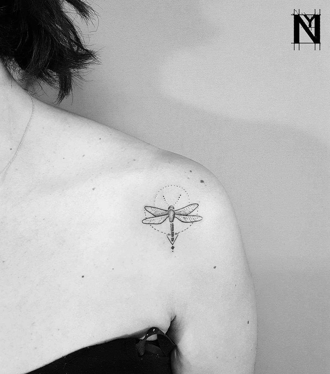Geometric dragonfly tattoo