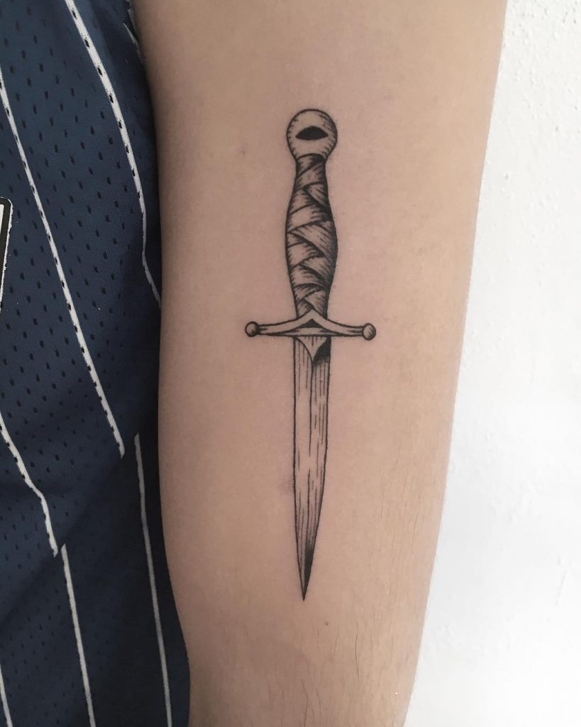 Grey dagger tattoo