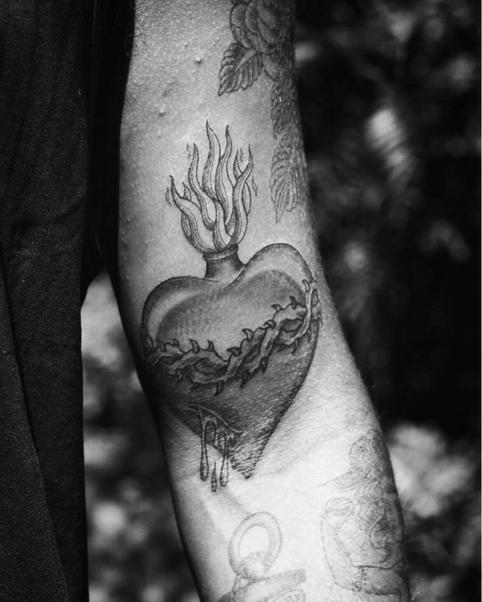 Grey sacred heart tattoo
