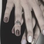 Hand-poked ring tattoo by Lindsay April