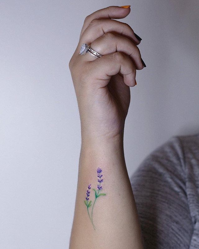 Hand-poked violet flower tattoo