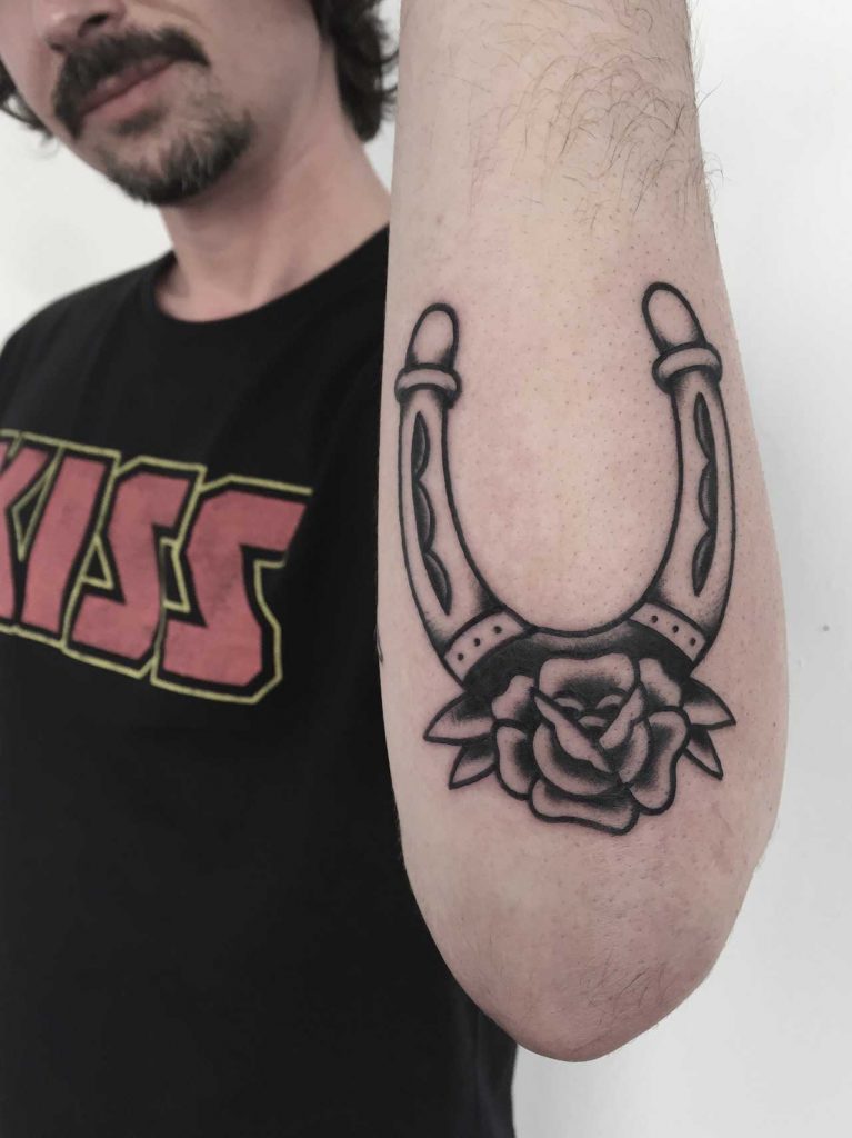 Horseshoe and rose tattoo on the forearm - Tattoogrid.net