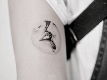 Kiss tattoo by Maxe Brother