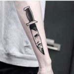 Knife reflection tattoo by Jonas Ribeiro