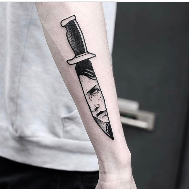 Knife reflection tattoo by Jonas Ribeiro