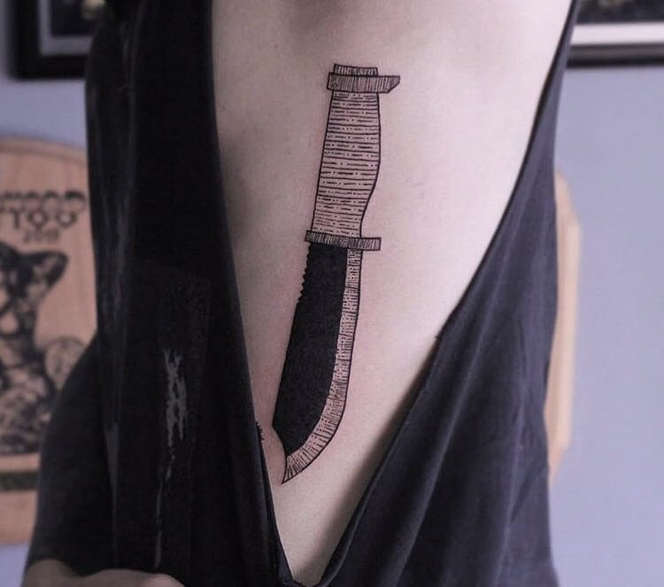Knife tattoo by Kyle Kyo Koko