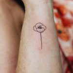 Little fine line poppy by Kalula Tattoo