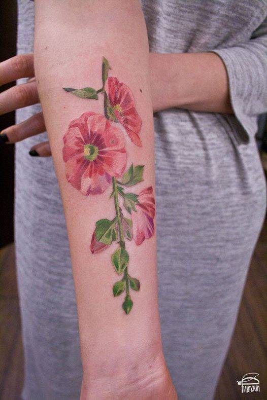 Malva tattoo on the forearm
