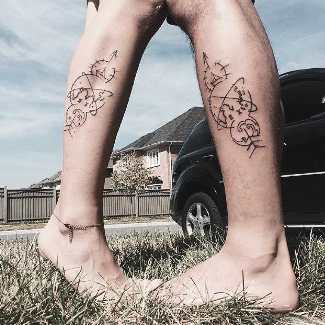 Matching compass tattoos by tattooist Cysen
