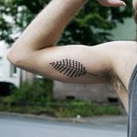 Minimalist leaf tattoo