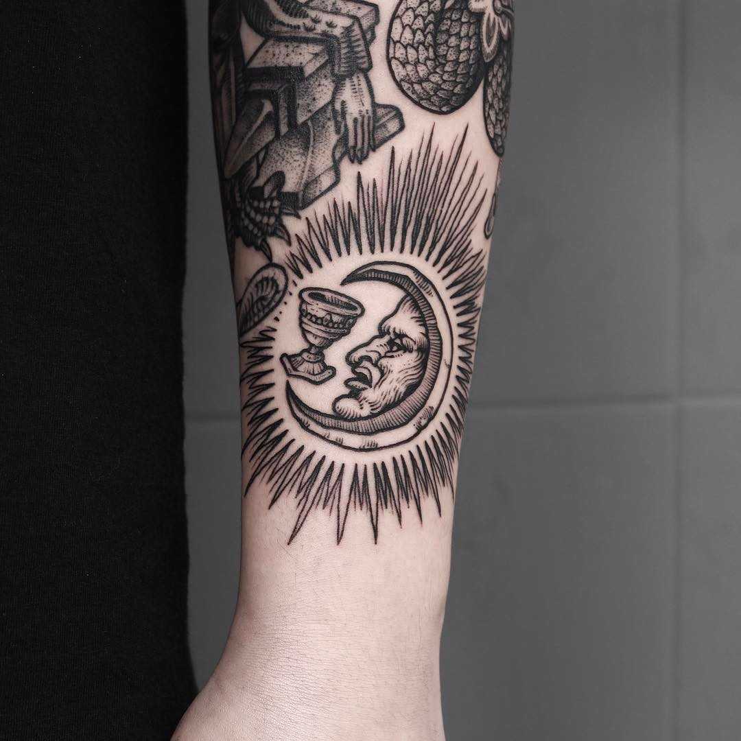 Moon and glass tattoo