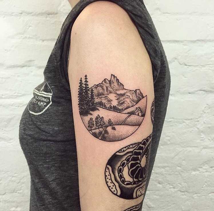 Mountain scenery tattoo by Tanya De Souza