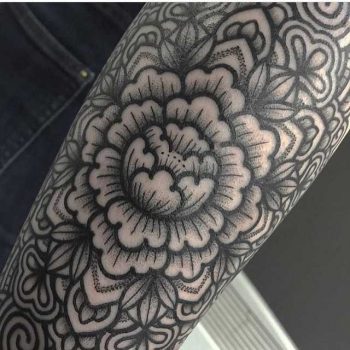 Ornamental flower by Mark Tattooist