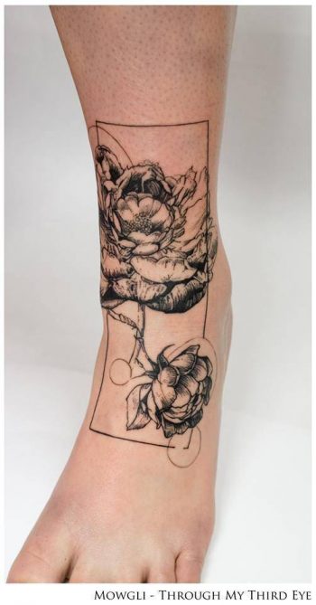 Peony tattoo on the left shin