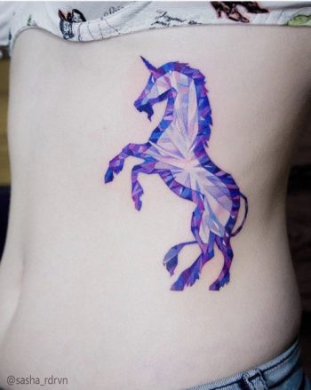 Purple unicorn tattoo by Sasha Rdrvn