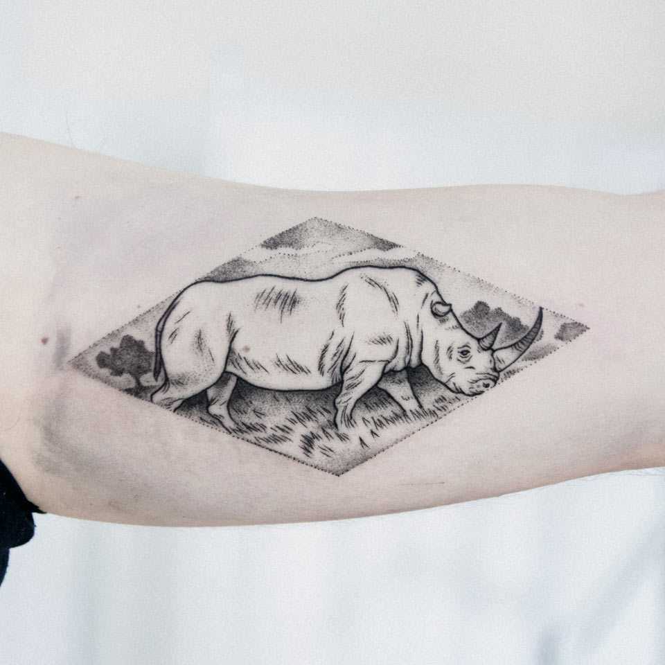 Rhino tattoo by Dogma Noir