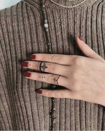 Ring tattoos by Ann Pokes