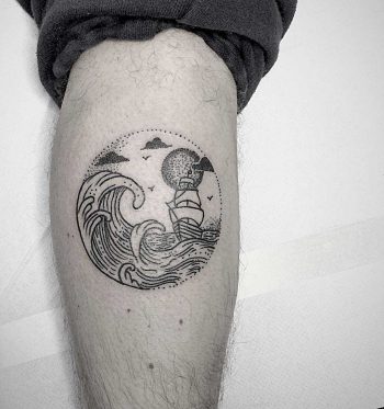 Ship in a sea tattoo