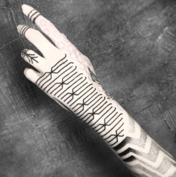 Simple geometric forearm tattoo