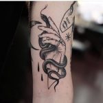 Snake handler tattoo by Jonas Ribeiro