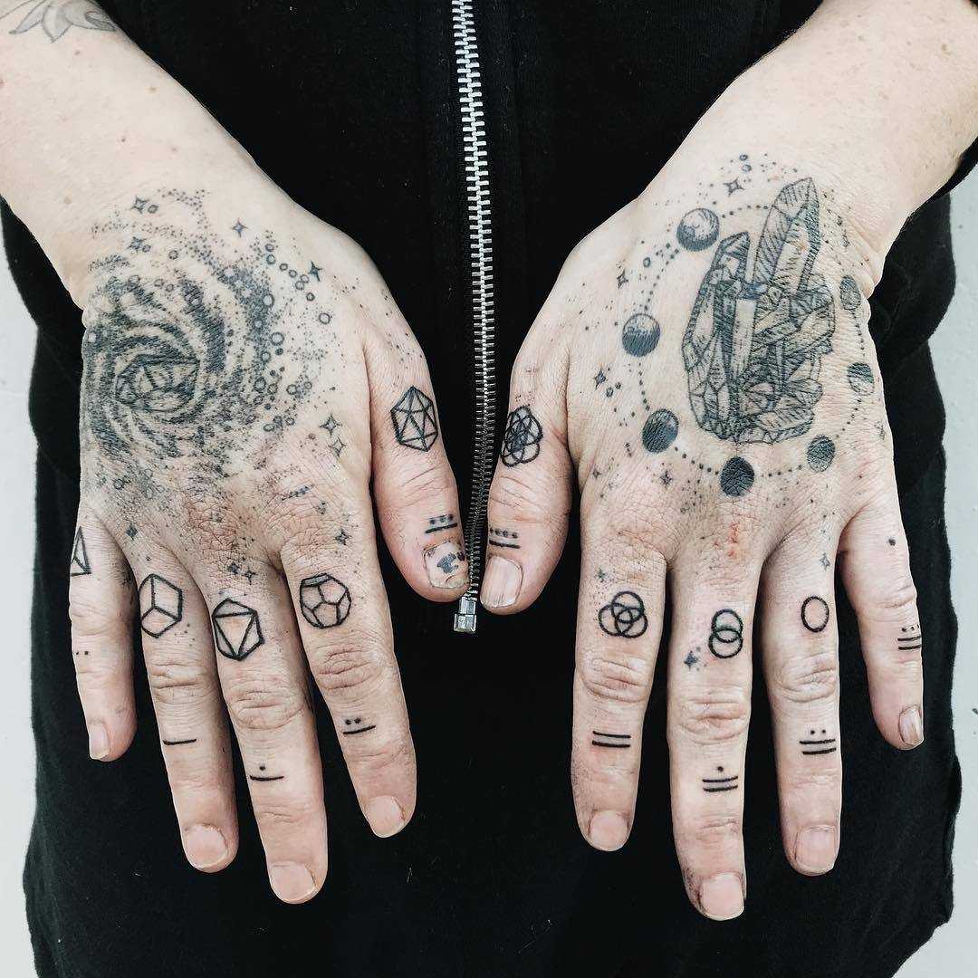 Tattooed hands by Pony Reinhardt