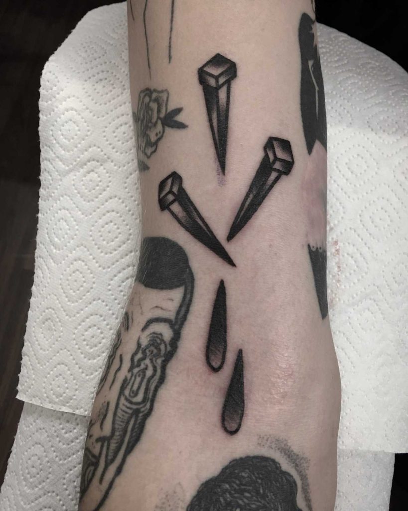 Three nails tattoo