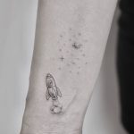 Tiny rocket tattoo by Pablo Torre