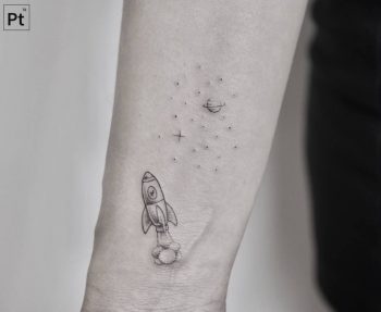 Tiny rocket tattoo by Pablo Torre