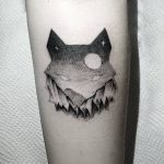 Wolf and mountains tattoo